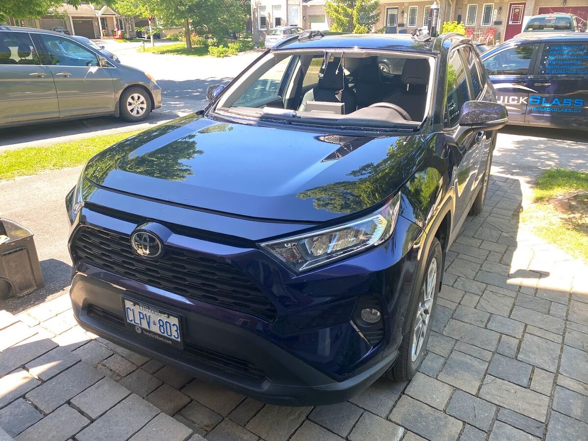 Mobile windshield replacement on a Toyota RAV4 in an Ottawa driveway