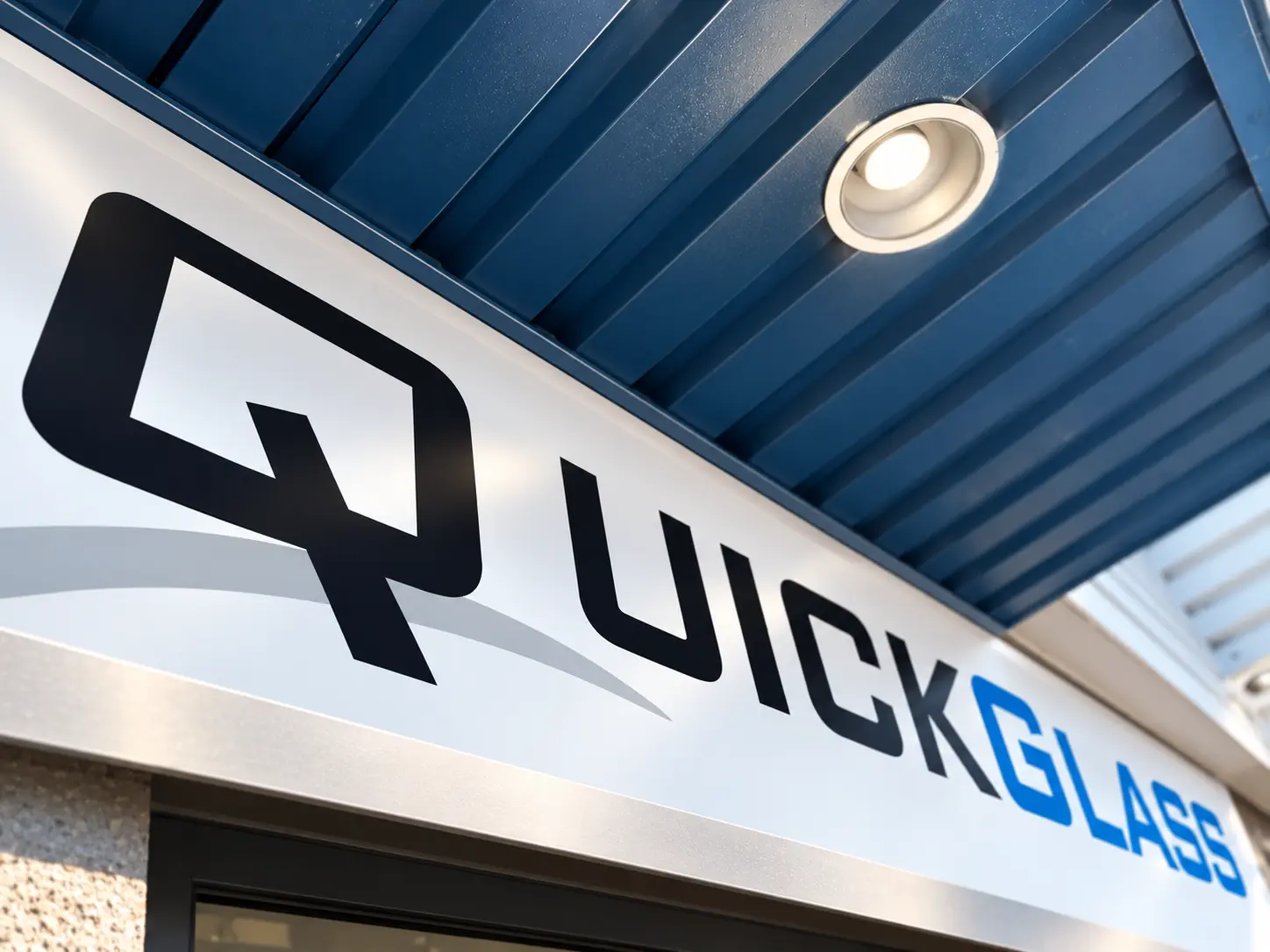 QuickGlass sign above the shop entrance in Ottawa